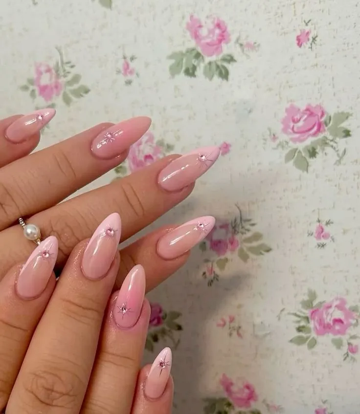 Baby pink light pink almond nails with gems
