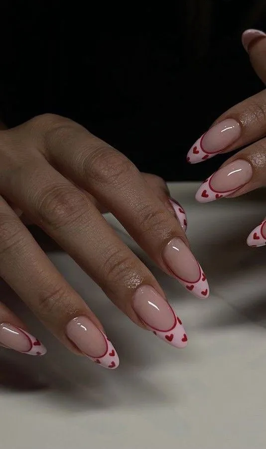 Pink French Tip Nails With Hearts Outline