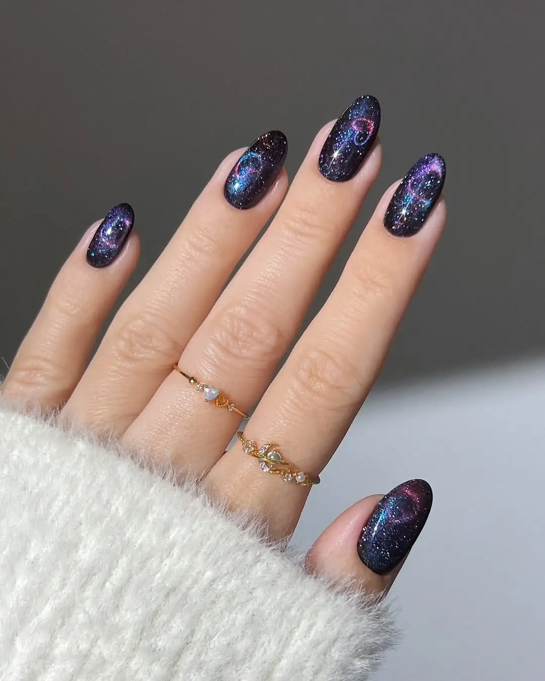 Stunning Blue Galaxy Cat Eye Nails