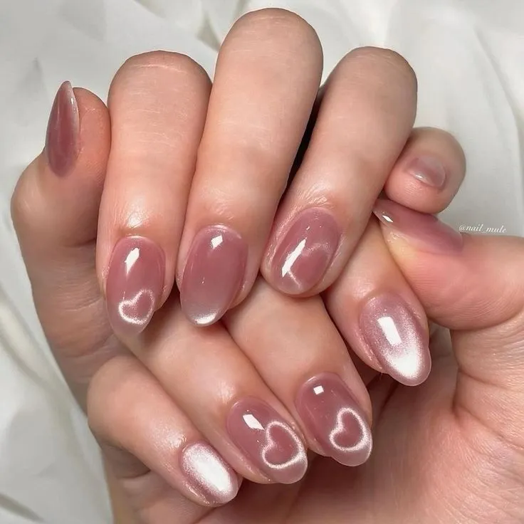 pink cat eye heart nail art