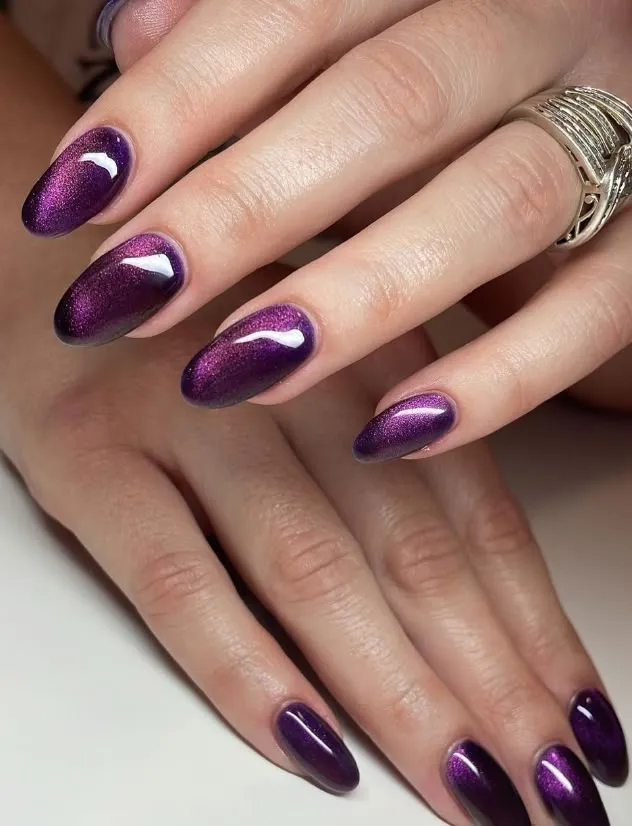 purple almond cat-eye manicure inspo 0