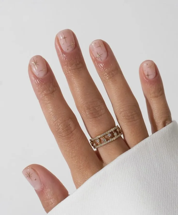 Clear Summer Nails with Golden Star Detailing