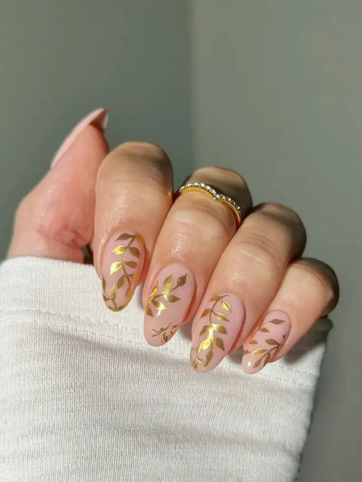 Gold leaves over simple base nails fall autumn