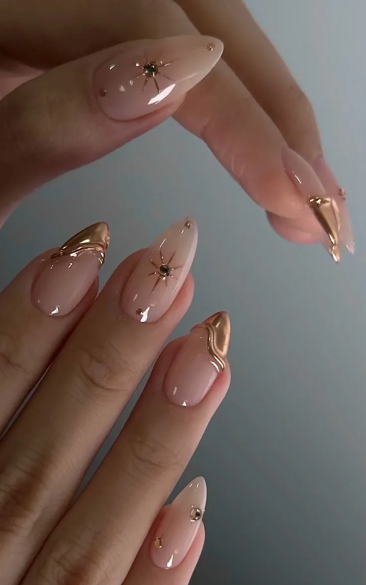 Nude and Gold Chrome September Nails with Star Accents