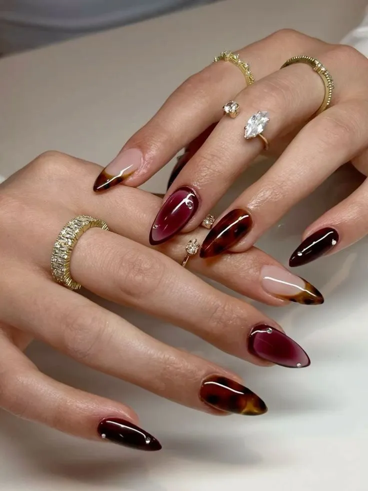 September Nails 2025 Red Mismatched Tortoise shell French tip almond nails