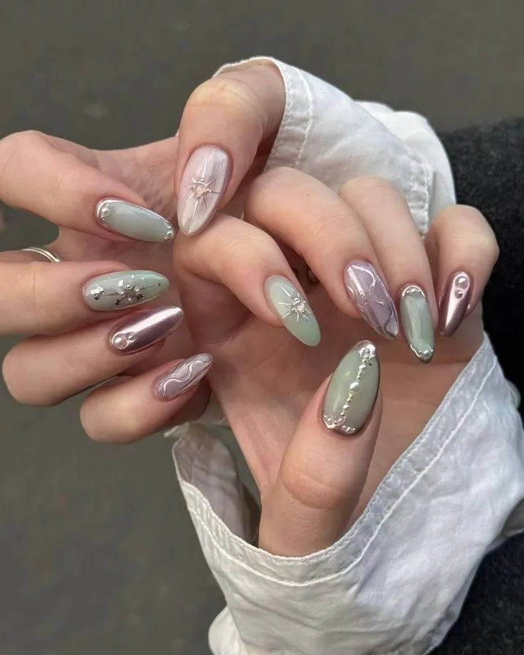 sage green and lilac chrome nails with 3D embellishments