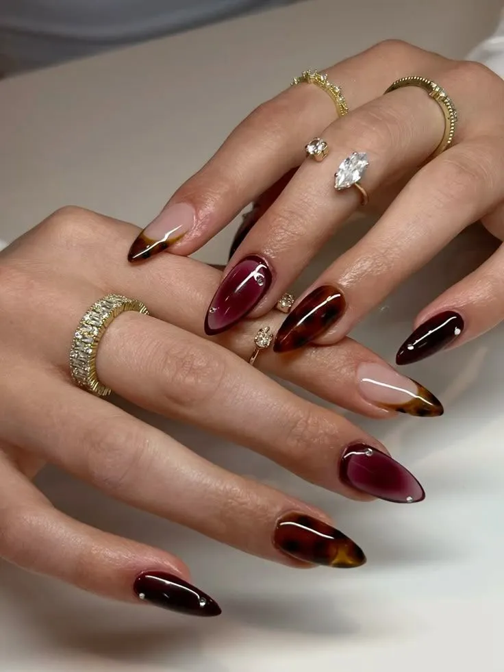 dark red nails design tortoiseshell and diamonds